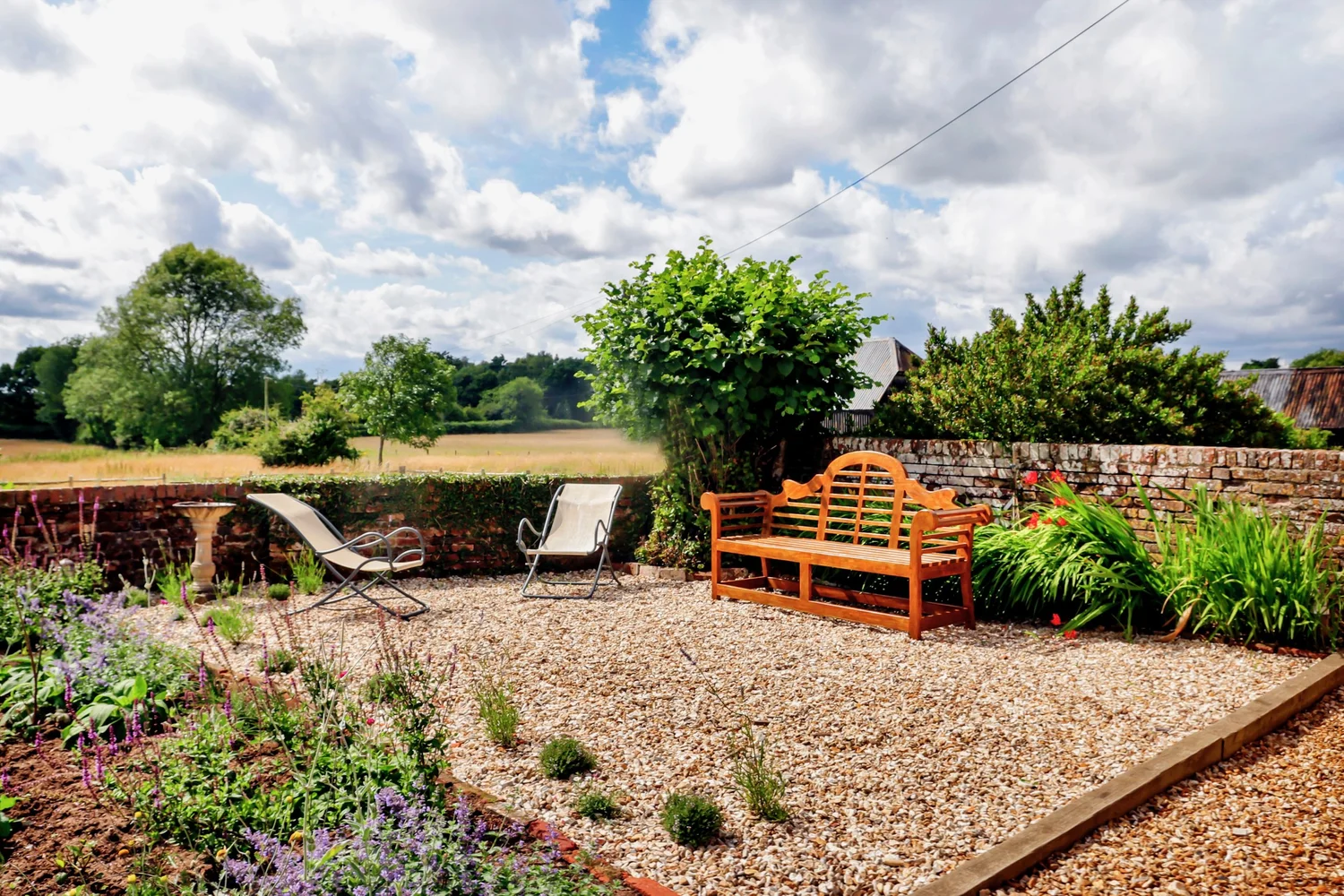 Aerial view of meadows and woodland